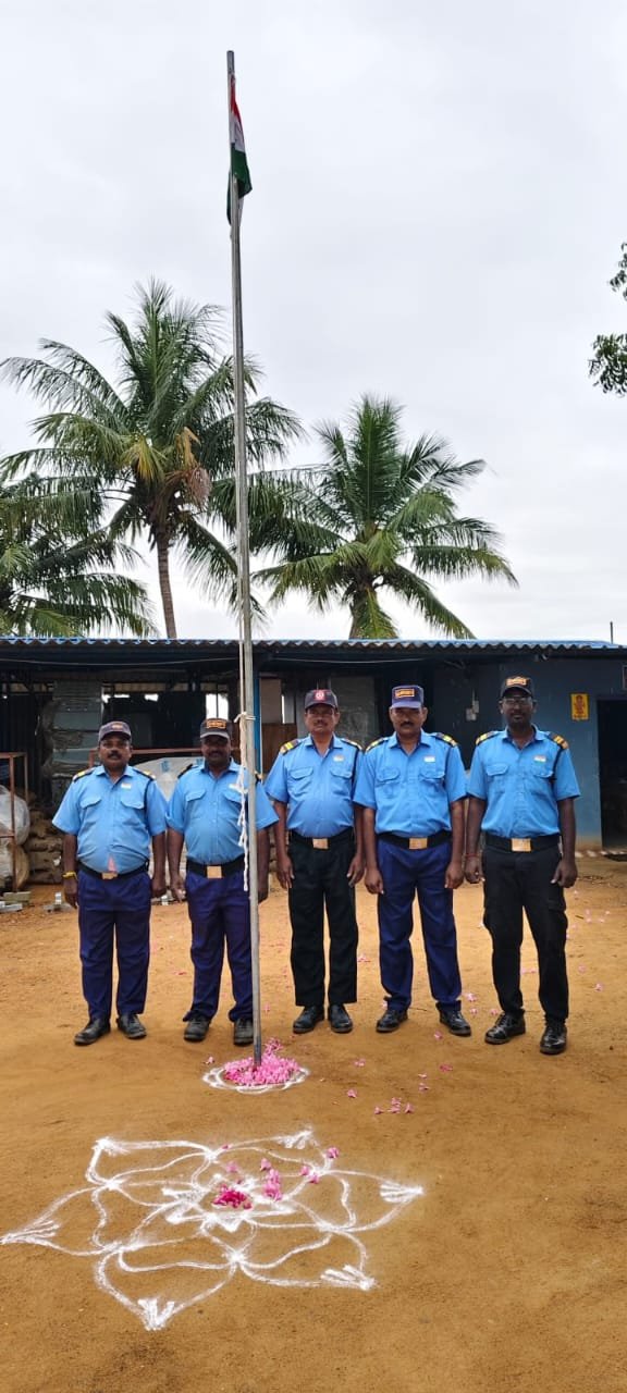 Security and site-support personnel assembled at an industrial location